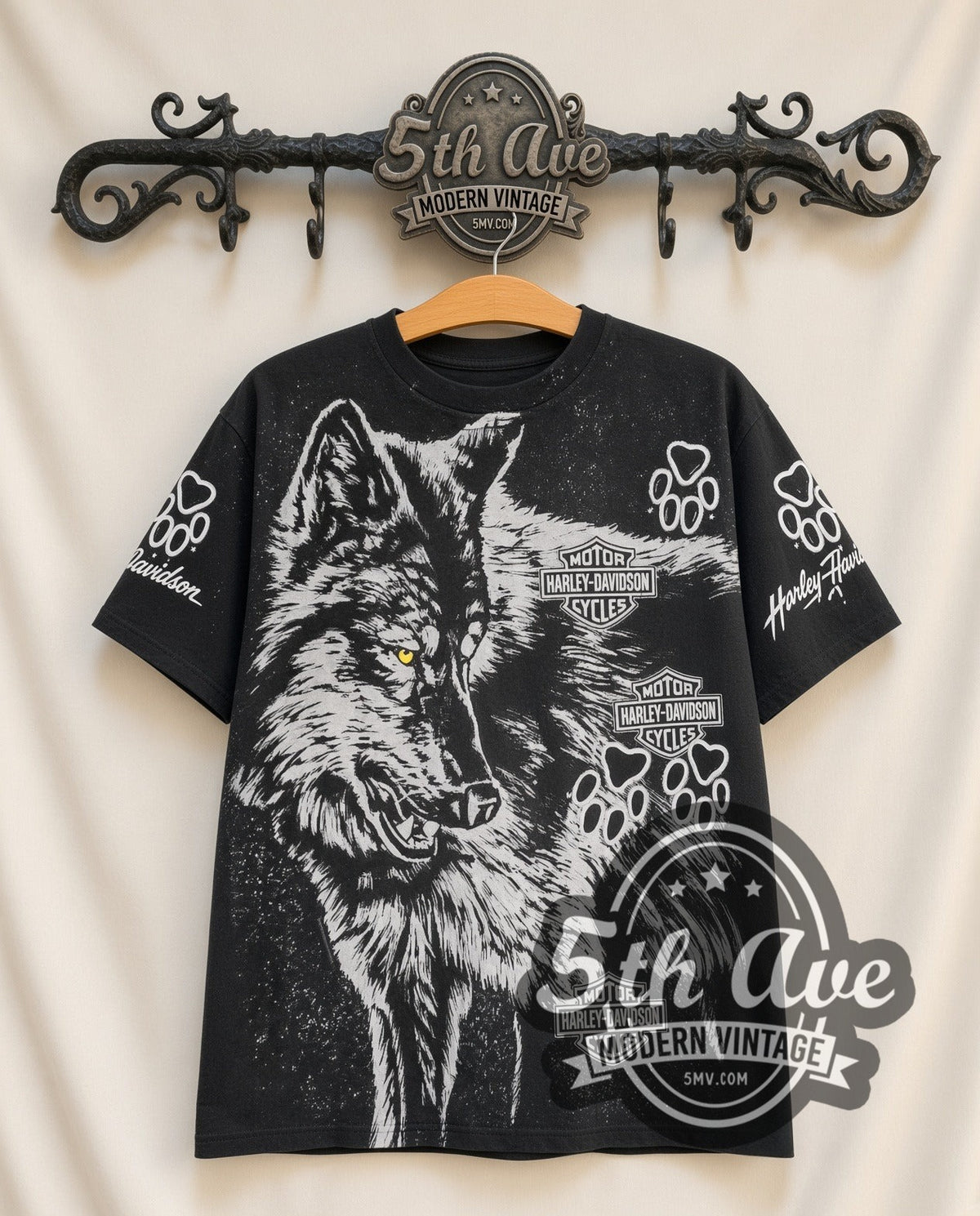 Harley-Davidson Wolf all-over-print vintage Harley tee in black, front view on a display rack