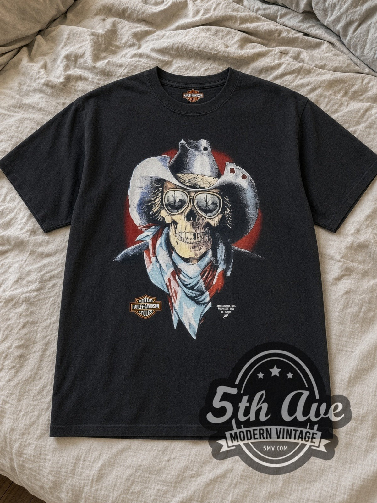 Black Harley Davidson Zepka Inc Johnstown Vintage Harley-Davidson T-Shirt laid flat on a linen bed
