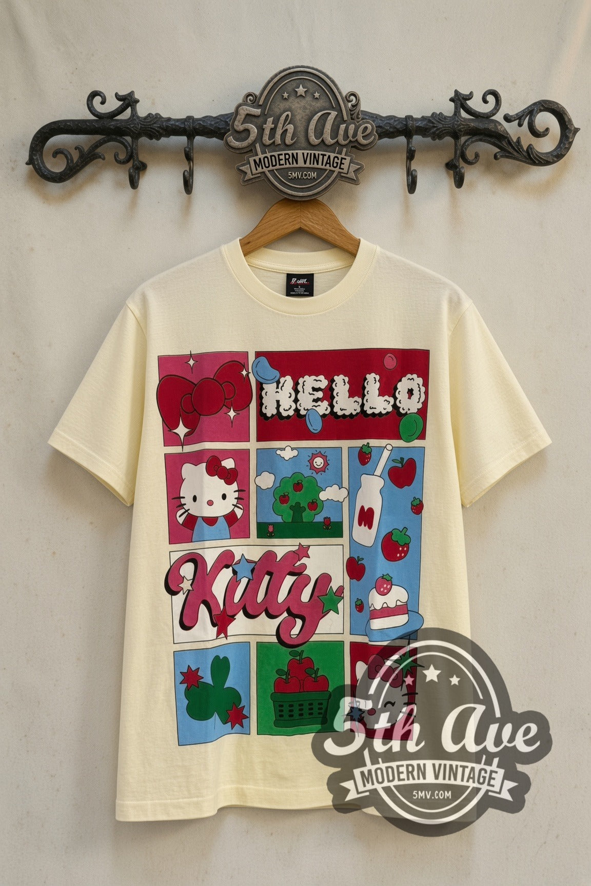 Hello Kitty Strawberry Grid & Polaroid Photos cartoon tee front on 5th Ave iron rack