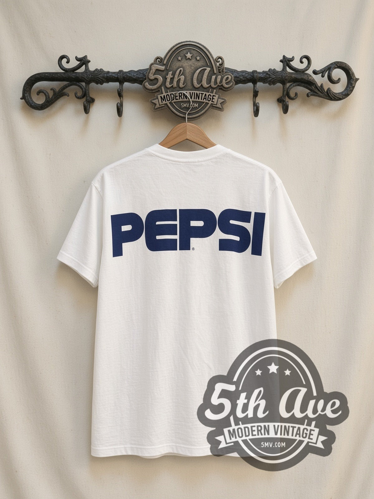 Home Alone Pepsi Kevin Scream vintage graphic t-shirt, back view on a display rack