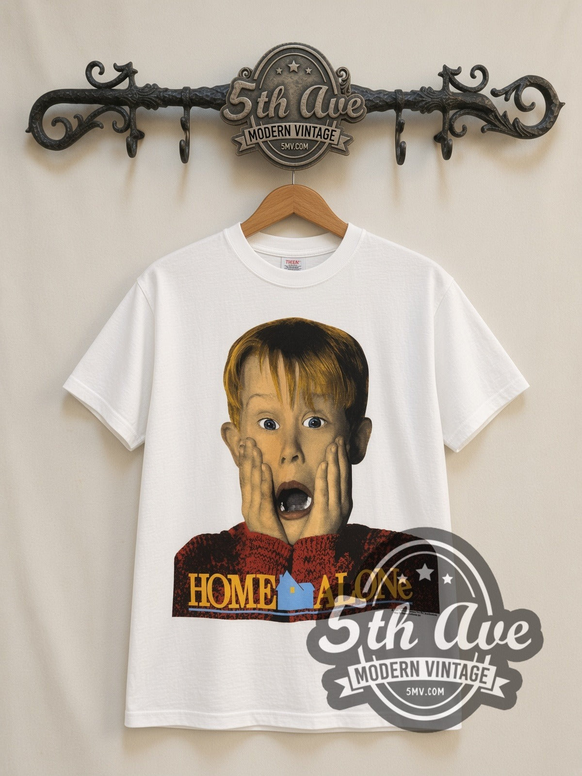 Home Alone Pepsi Kevin Scream vintage graphic t-shirt, front view on a display rack