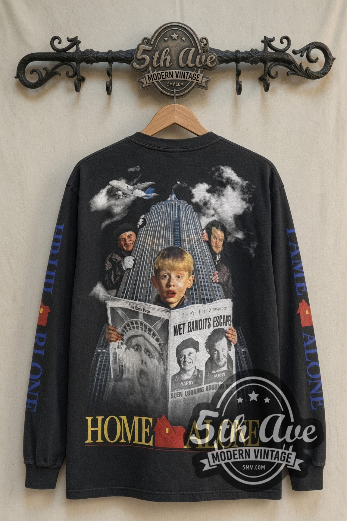 Home Alone Wet Bandits Escape Empire State print on long sleeve back on rack