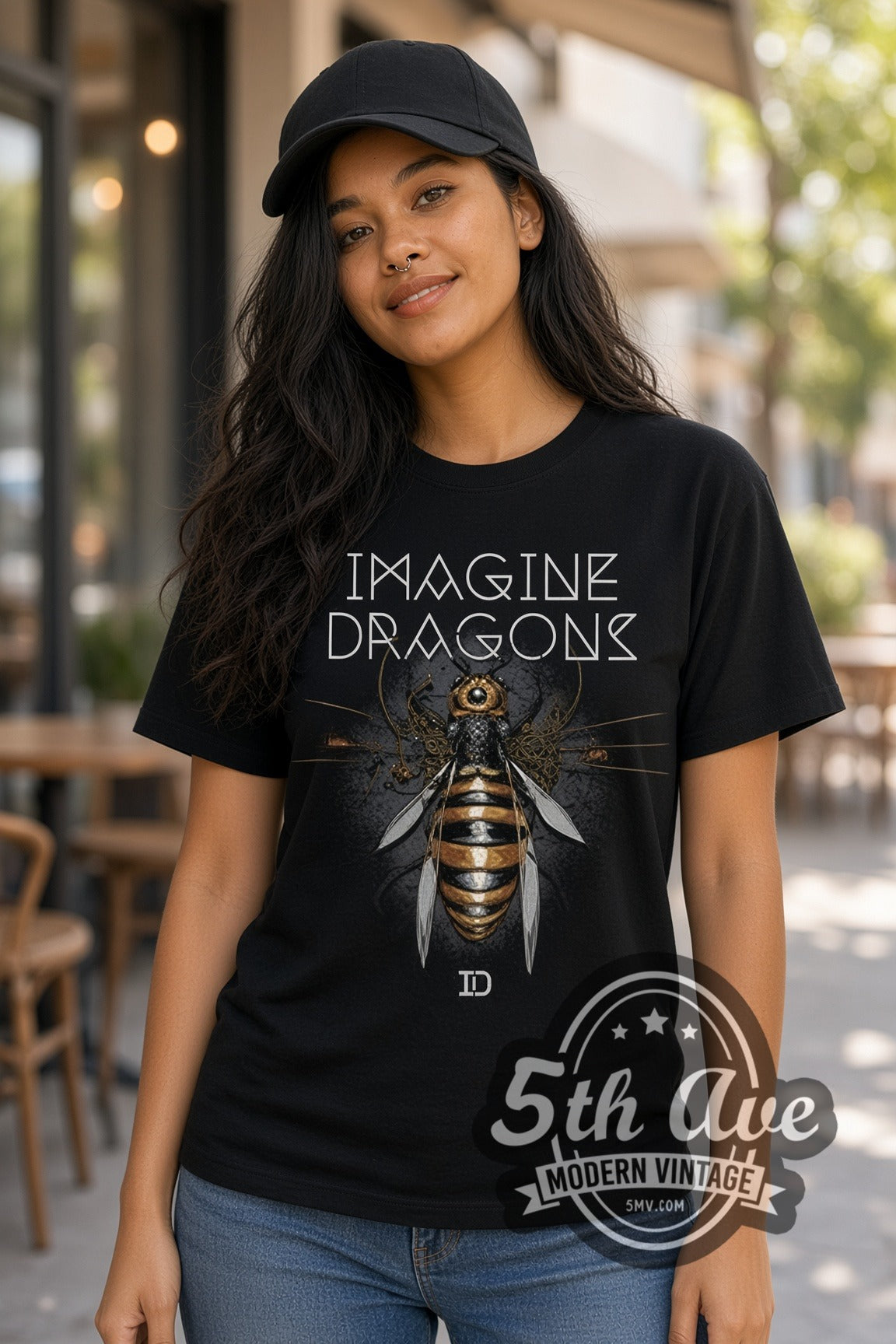 Woman wearing Imagine Dragons Mechanical Bee double stitched black graphic tee
