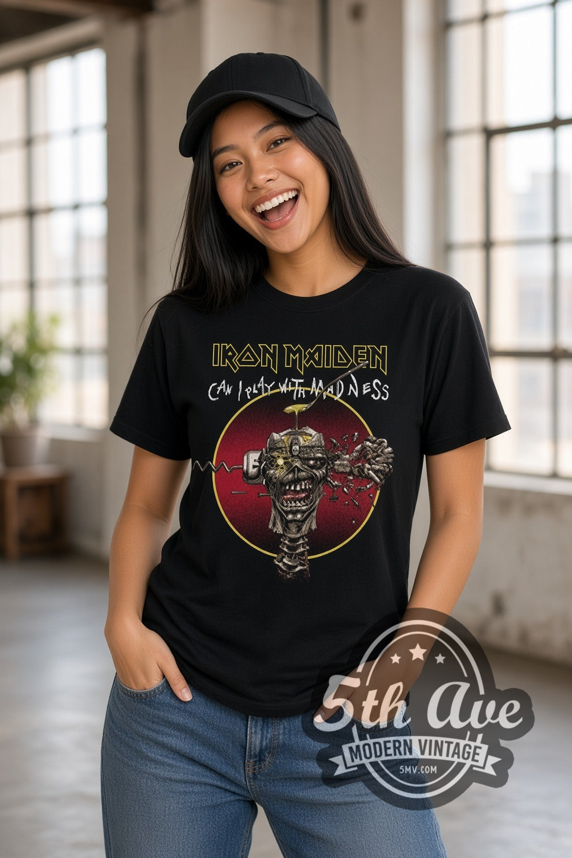 Woman wearing Iron Maiden Can I Play with Madness Eddie double stitched black graphic tee