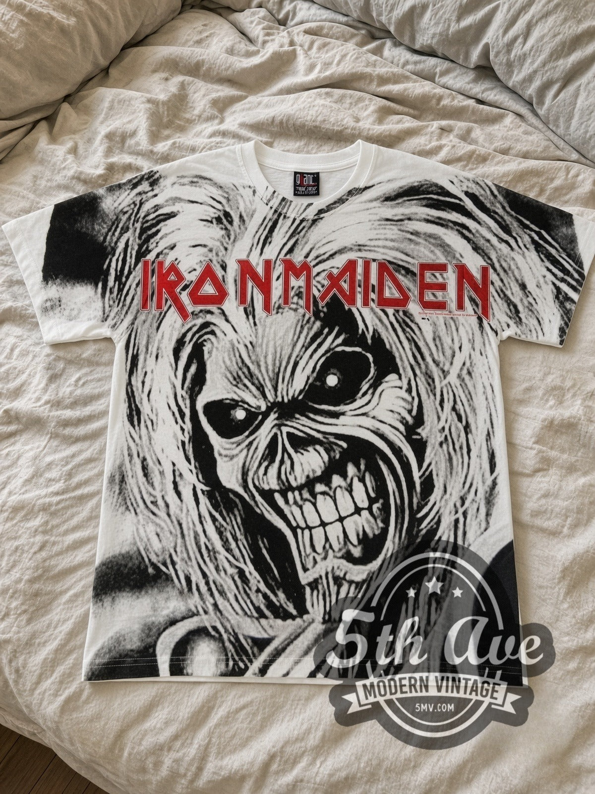 Iron Maiden Eddie Face White all-over-print vintage band tee laid flat