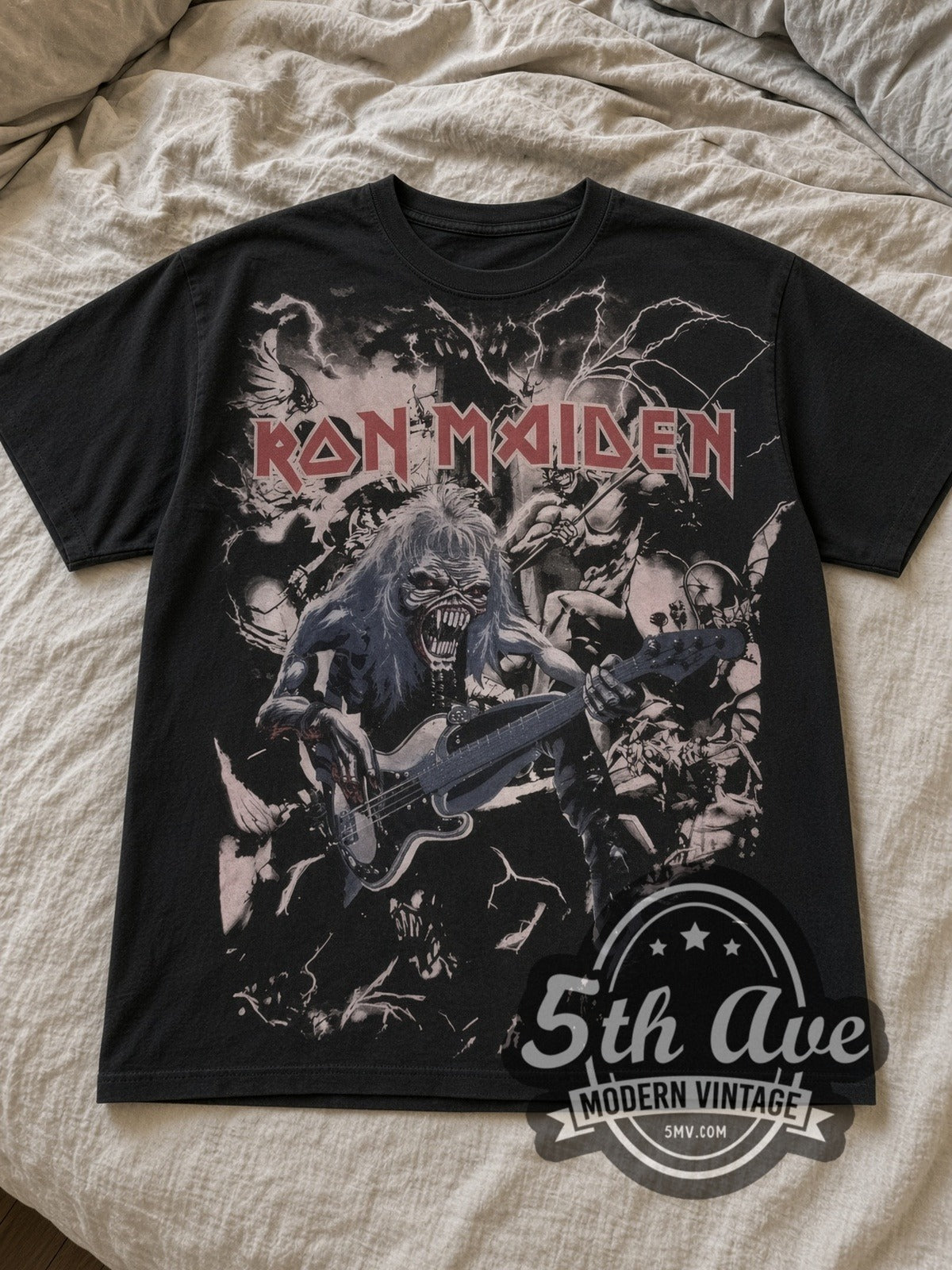 Black Iron Maiden Eddie Overprint Vintage Band T-Shirt laid flat on a linen bed