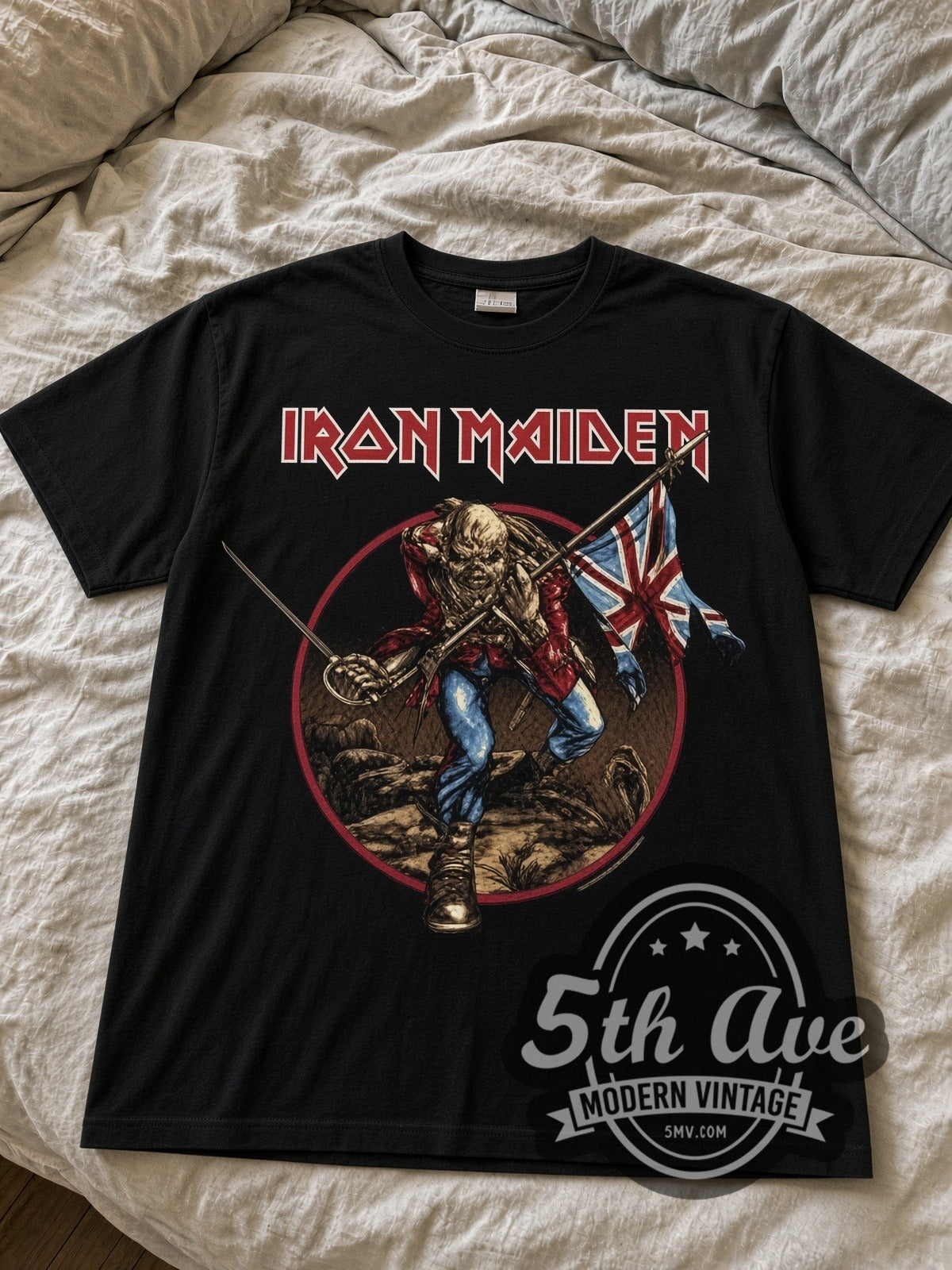 Iron Maiden The Trooper Eddie with Union Jack black graphic tee laid flat on linen bed