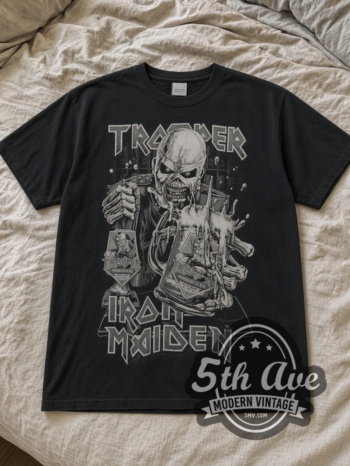 Black Iron Maiden Eddie Trooper Premium Beer Mug Vintage Band T-Shirt laid flat on a linen bed