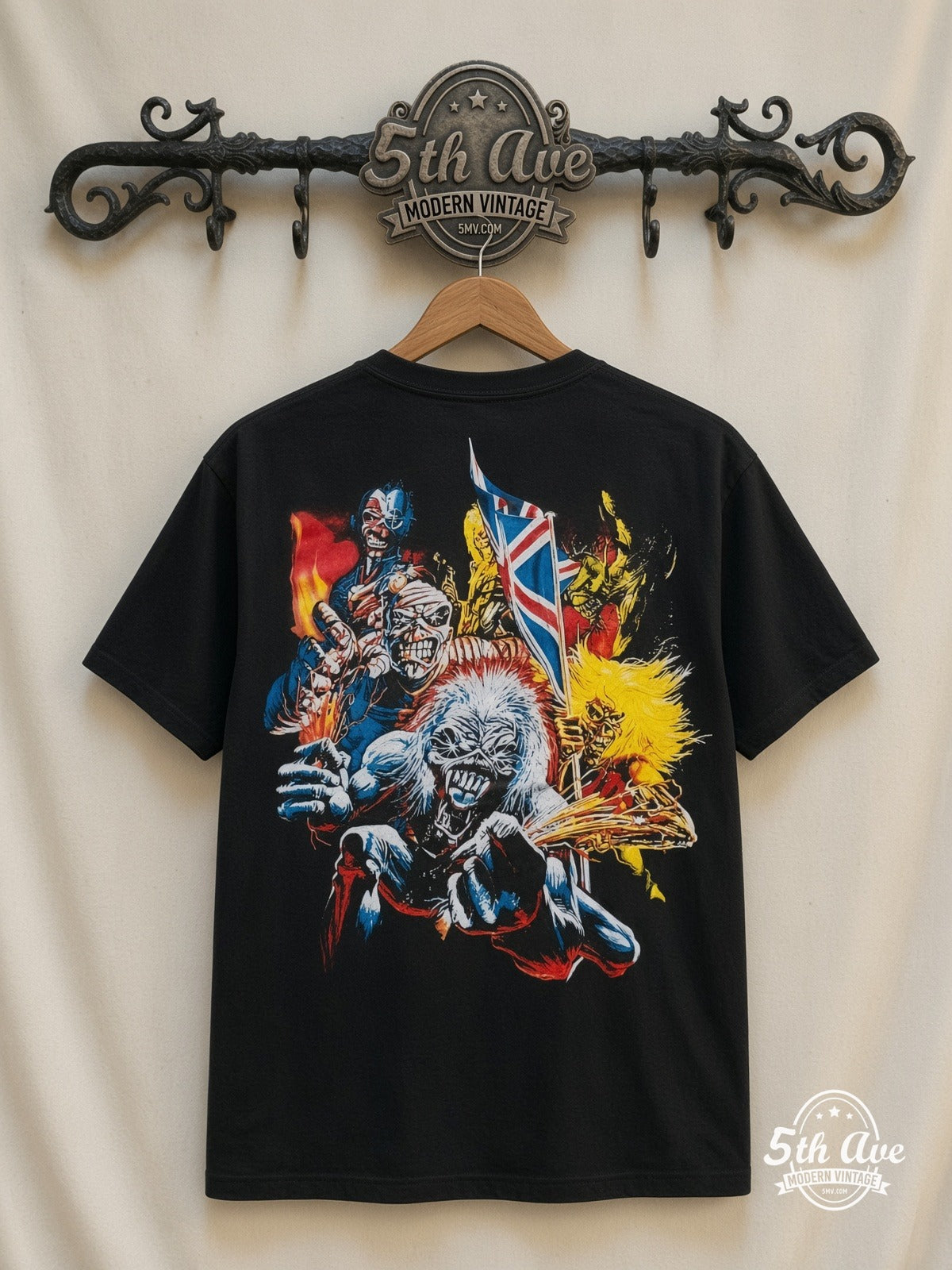 Iron Maiden Trooper Eddie all-over-print vintage band t-shirt in black, back view on a display rack