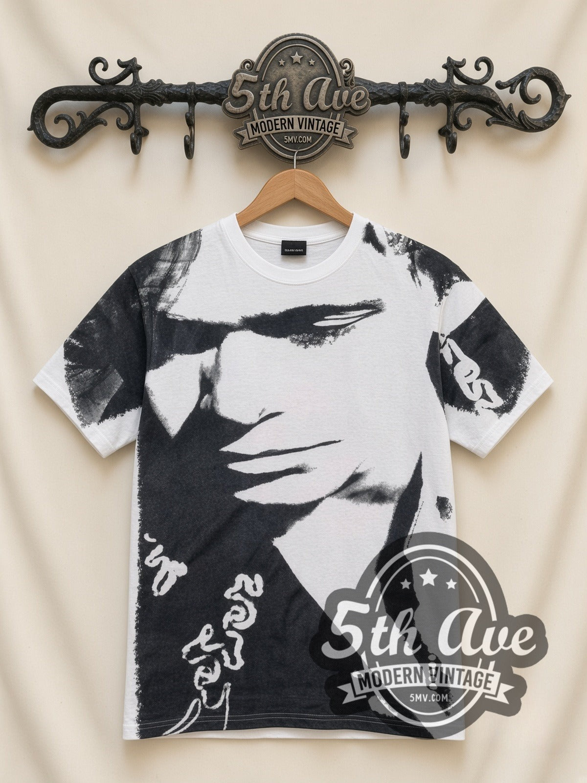 John Mellencamp Whenever We Wanted Tour 1992 all-over-print vintage band t-shirt in white, front view on a display rack