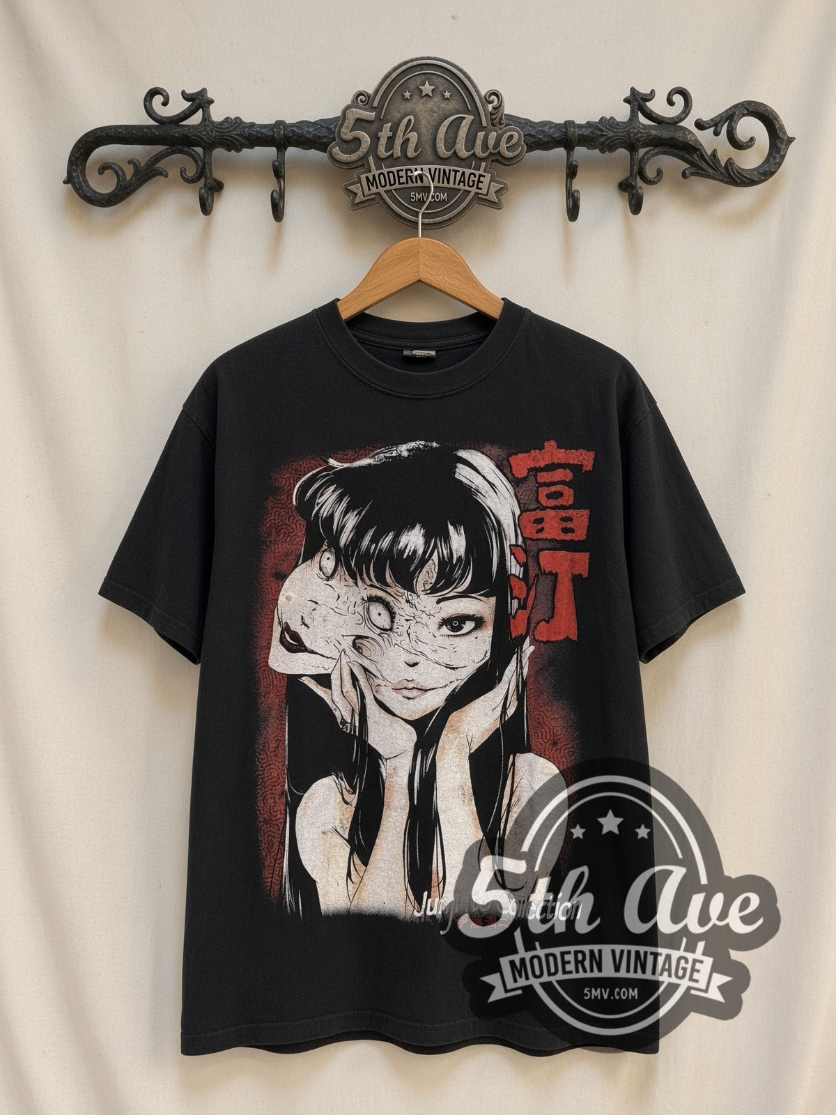 Junji Ito Tomie Collection vintage anime t-shirt, front view on a display rack