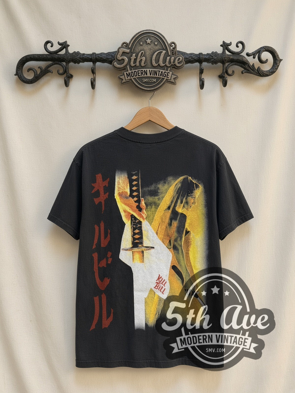 Kill Bill The Bride Uma vintage movie t-shirt, back view on a display rack
