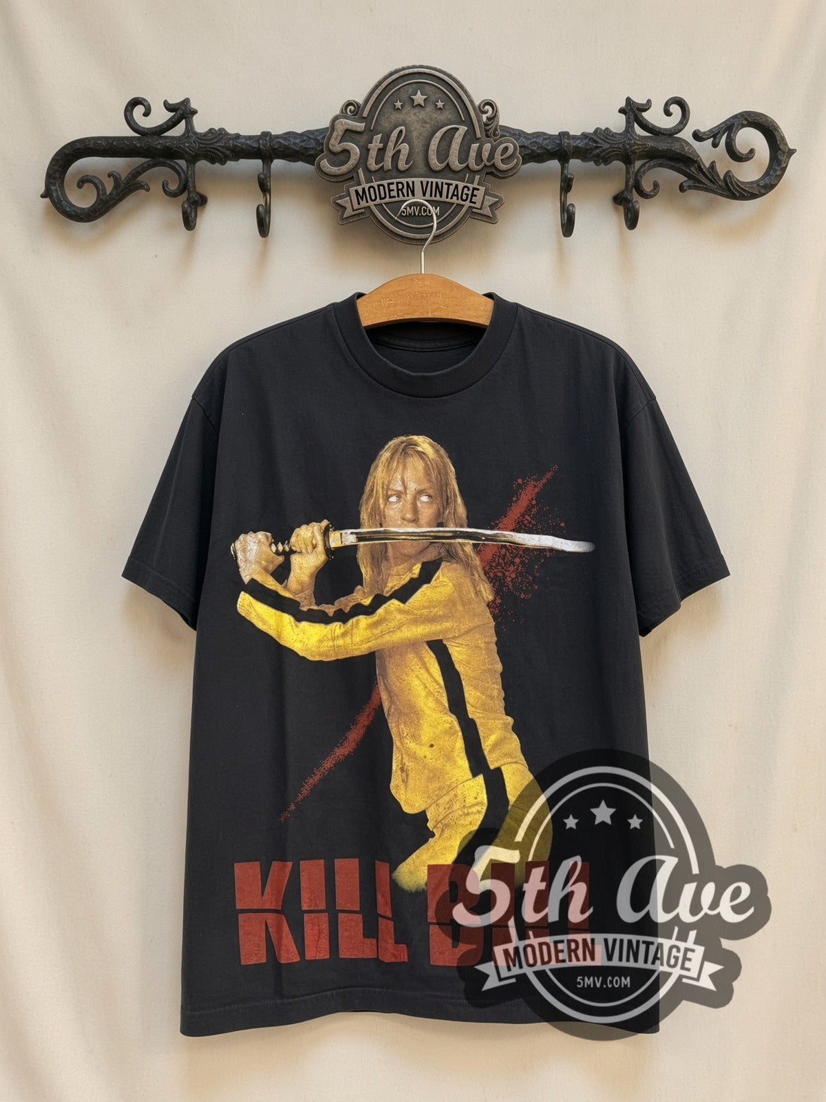 Kill Bill The Bride Uma vintage movie t-shirt, front view on a display rack