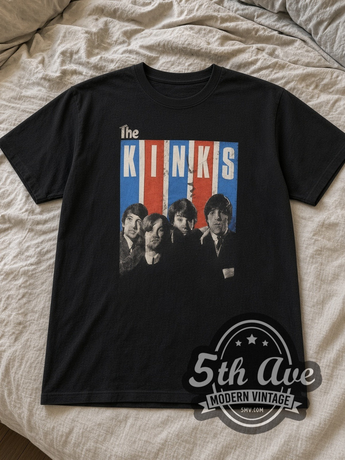 Black The Kinks Vintage Band T-Shirt laid flat on a linen bed