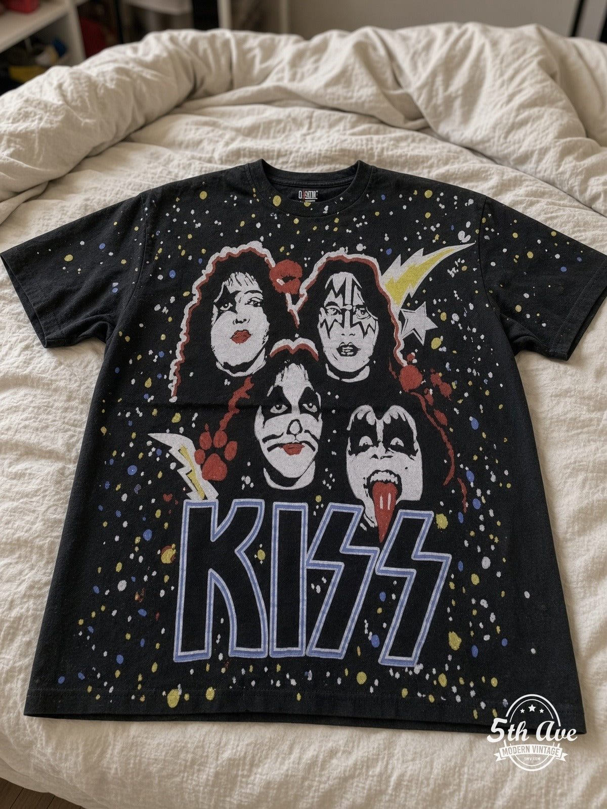 KISS Galaxy Faces all over print vintage tee laid on bed