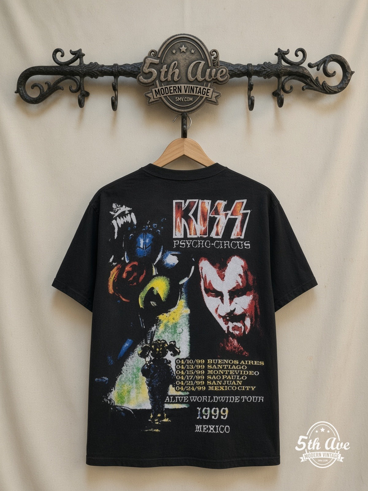 KISS Psycho Circus Mexico 1999 all-over-print vintage band t-shirt in black, back view on a display rack
