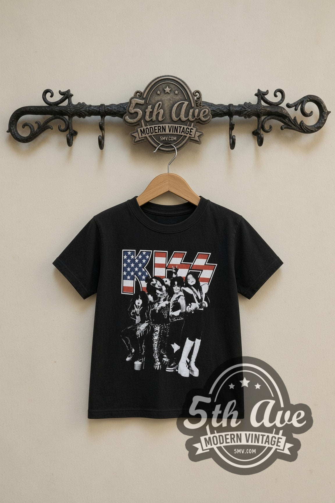 KISS Stars and Stripes Tiger Stadium kids band tee in black, front view on a display rack