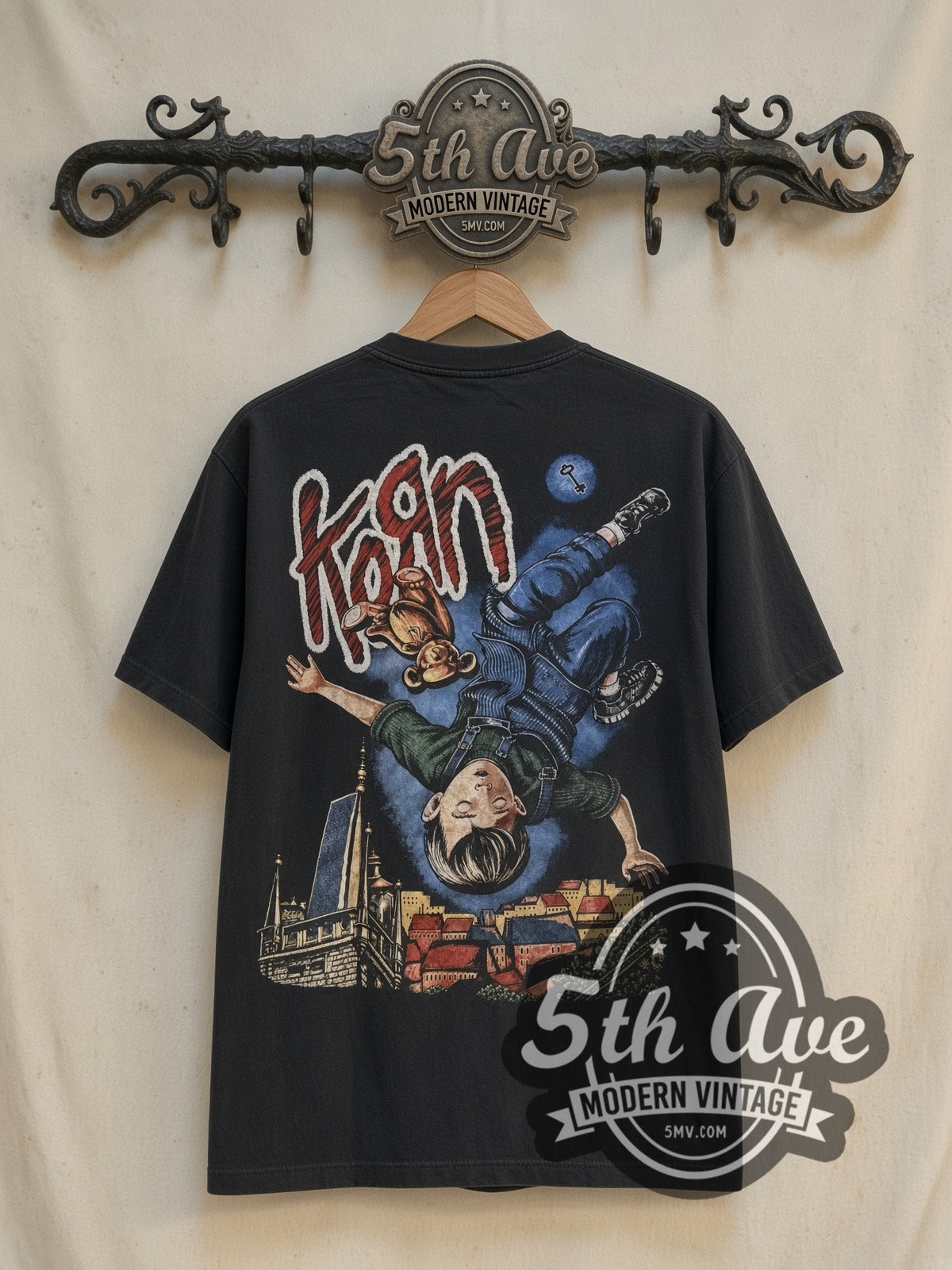 Korn Girl, Tiger and Upside-Down Boy City vintage band t-shirt back on cream 5th Ave rack