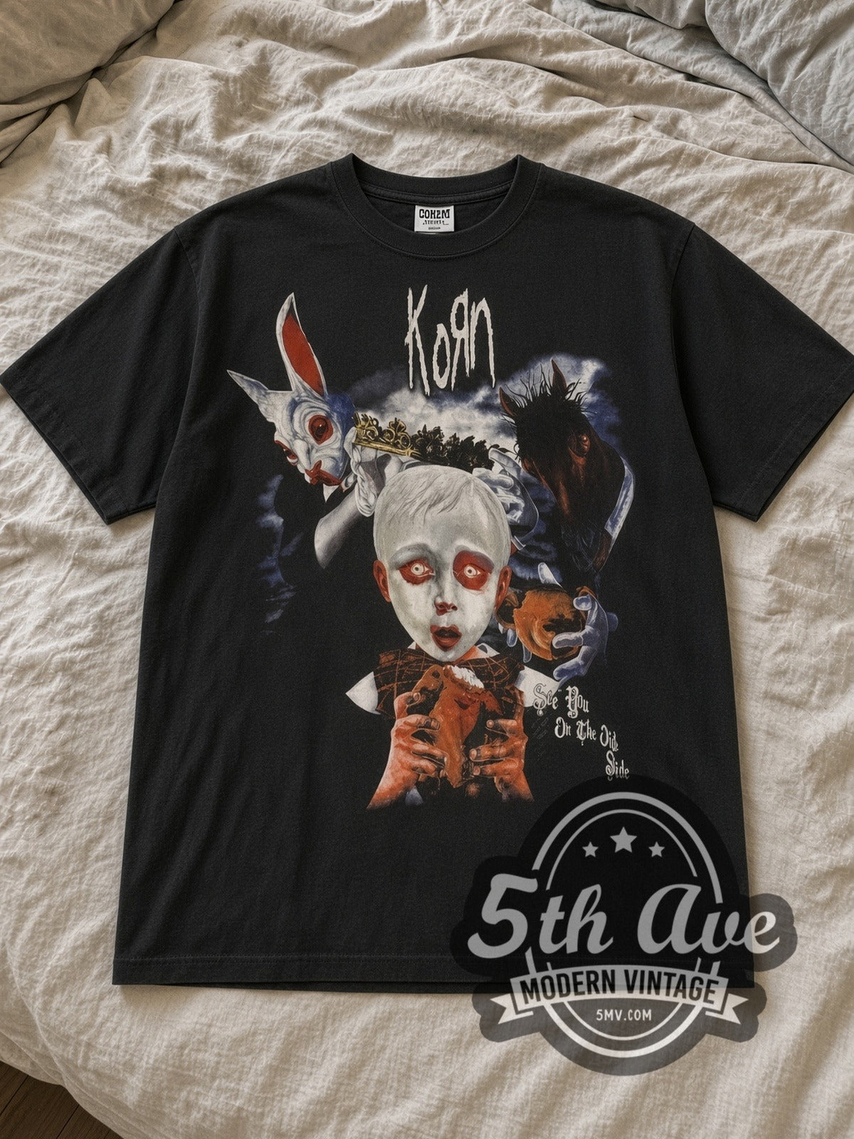Black Korn Tour 2006 Vintage Band T-Shirt laid flat on a linen bed
