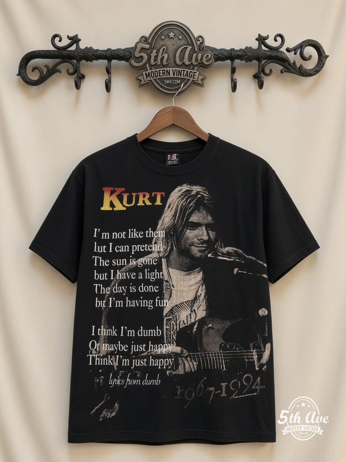 Kurt Cobain Nirvana Live At Last all over print vintage band t-shirt front on cream 5th Ave rack