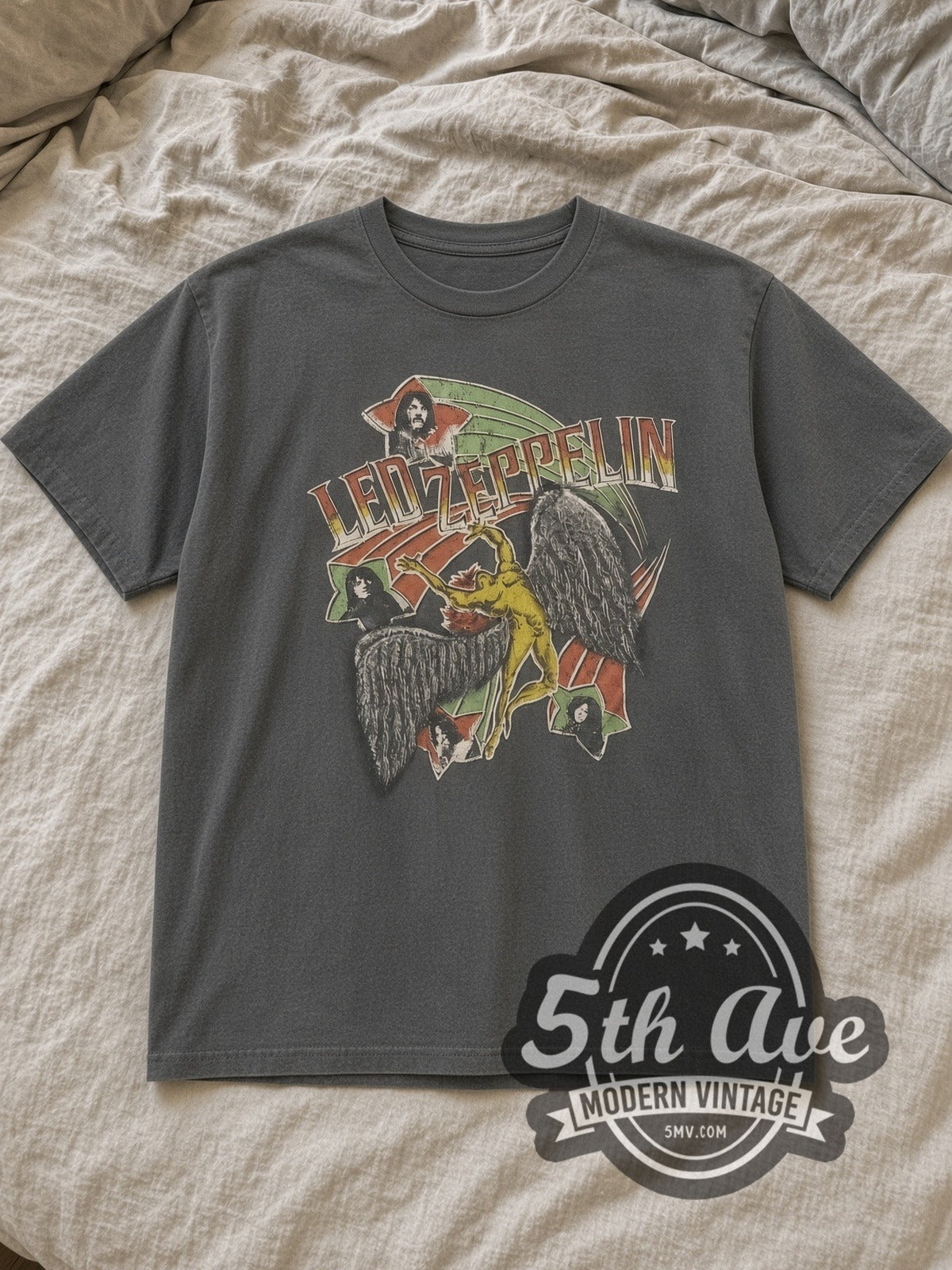 Charcoal Led Zeppelin Retro Portrait Vintage Band T-Shirt laid flat on a linen bed