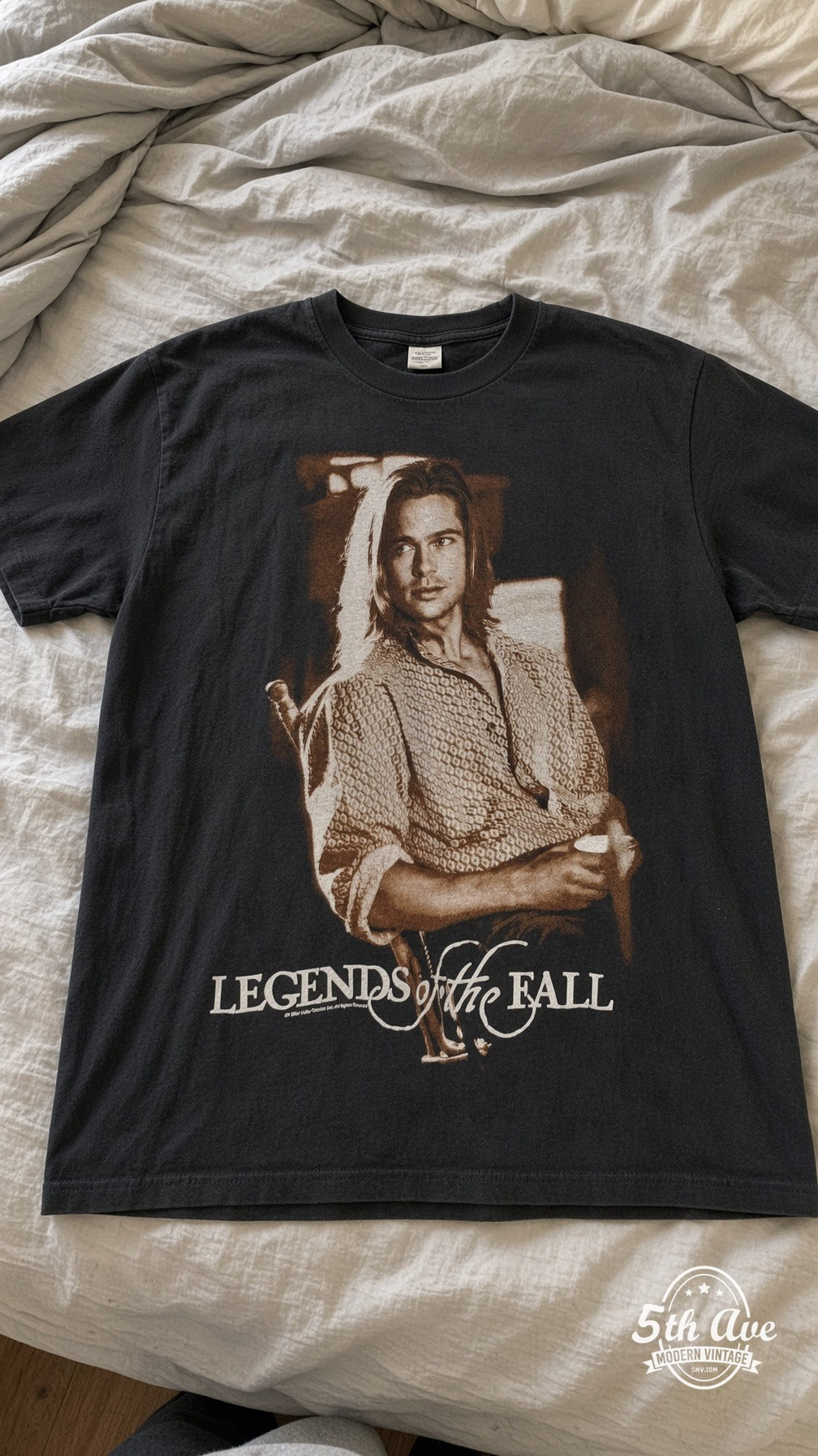Legends of the Fall vintage t-shirt laid on bed