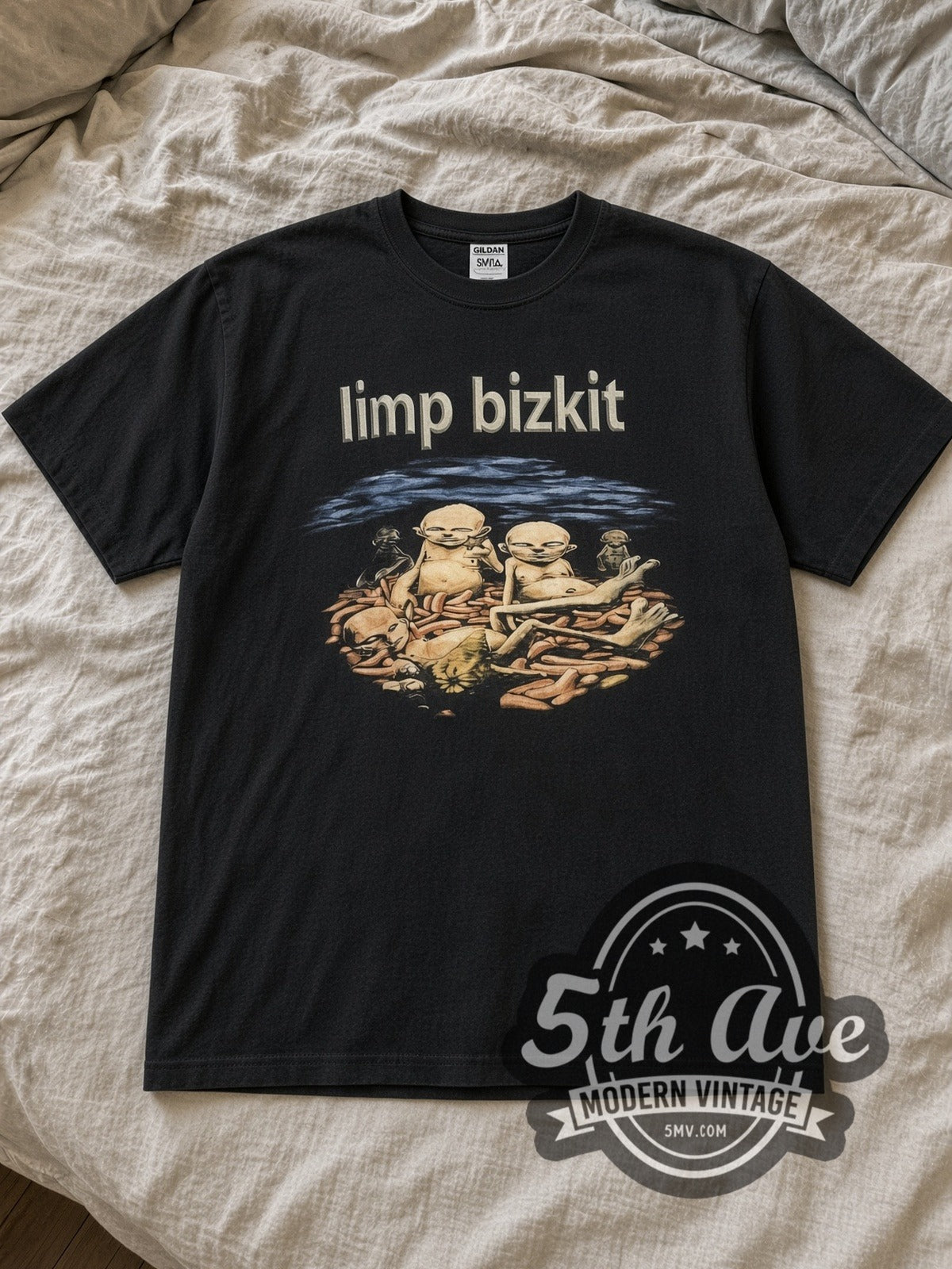 Black Limp Bizkit Anger Management Hot Dogs Europe Dates Vintage Band T-Shirt laid flat on a linen bed