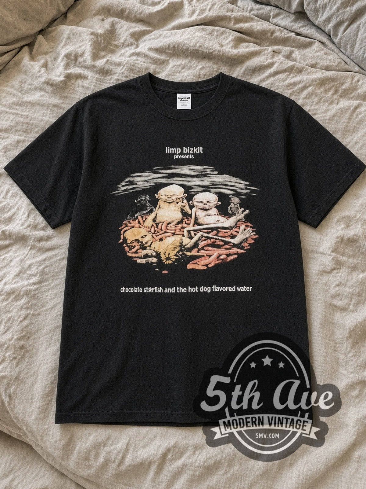 Black Limp Bizkit Chocolate Starfish Vintage Band T-Shirt laid flat on a linen bed