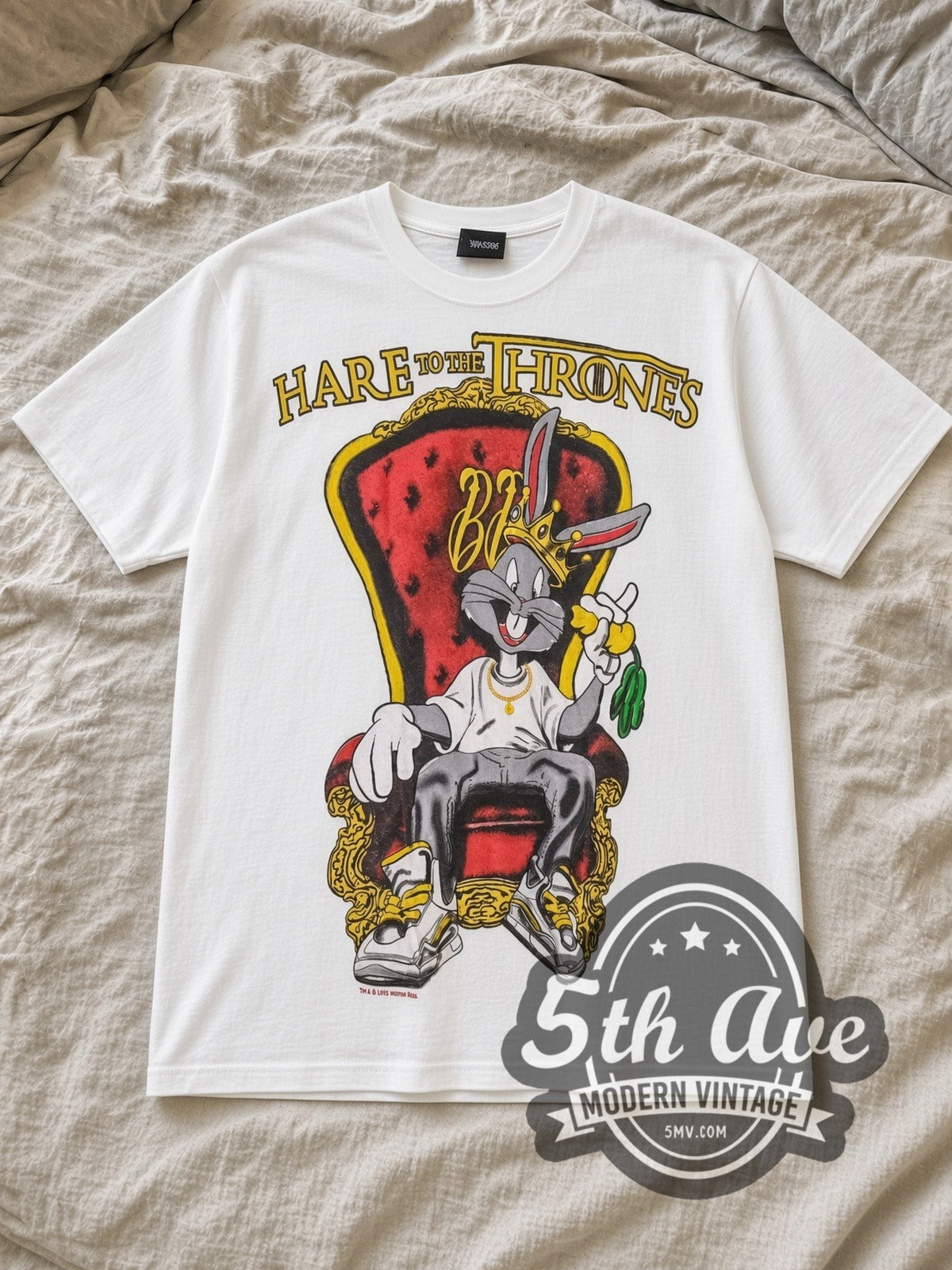 White Bugs Bunny Hare to the Throne Vintage Cartoon T-Shirt laid flat on a linen bed
