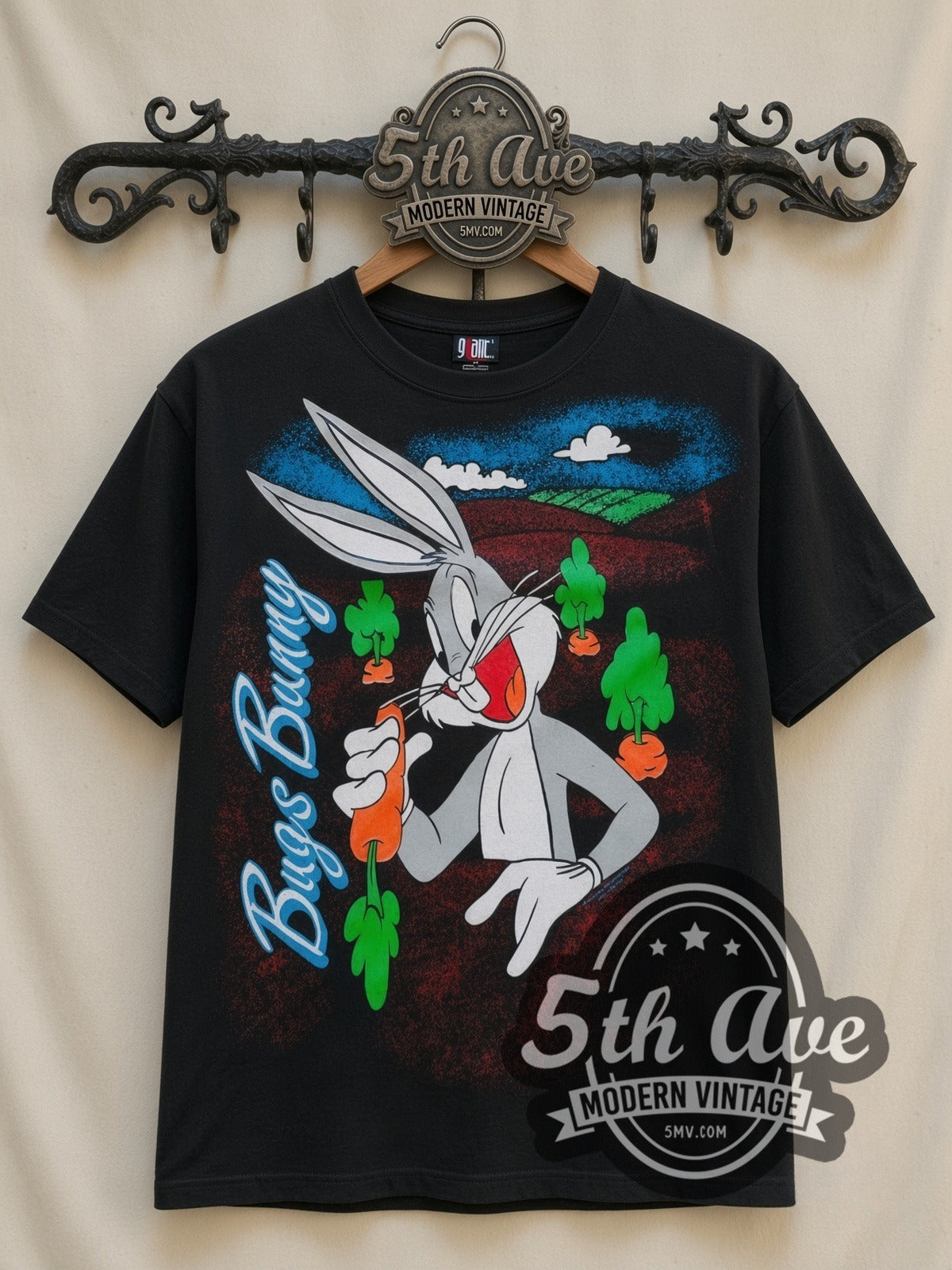 Looney Tunes Bugs Bunny Carrots all-over-print vintage cartoon t-shirt in black, front view on a display rack