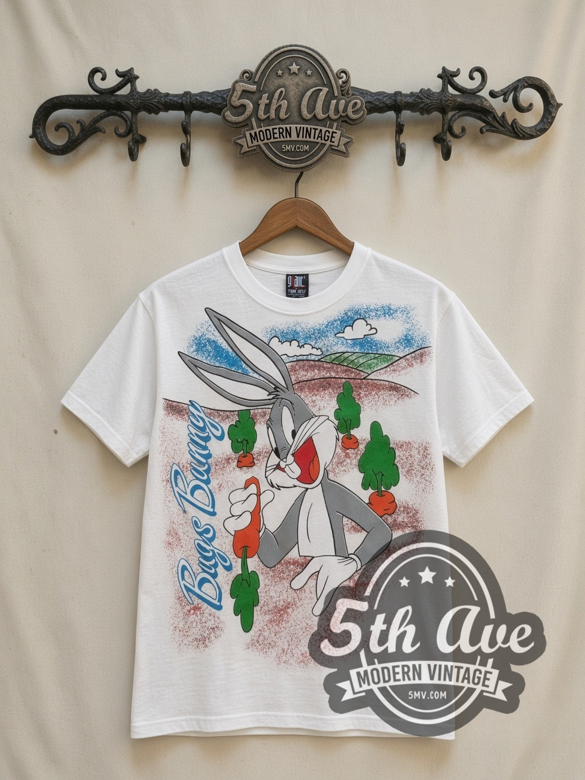 Looney Tunes Bugs Bunny Carrots all-over-print vintage cartoon t-shirt in white, front view on a display rack