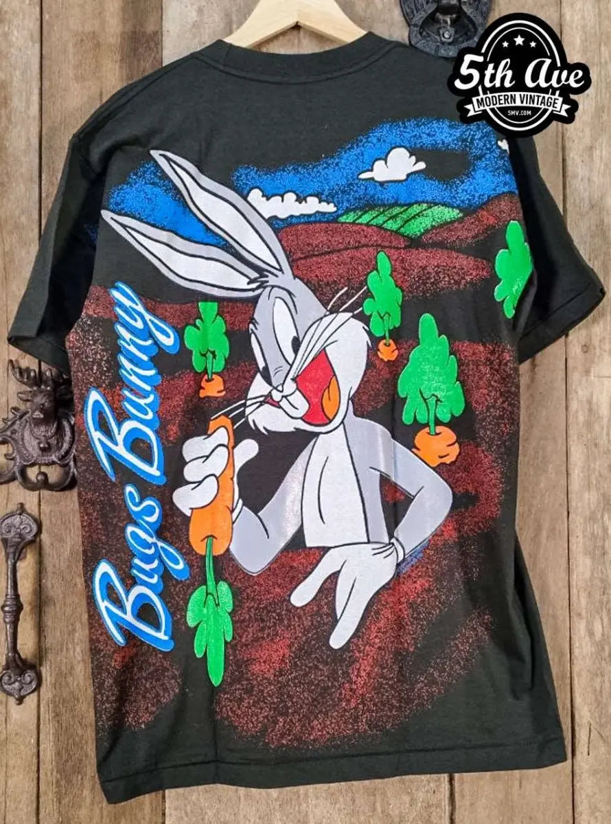 Bugs Bunny – Hare Throne – New Vintage Graphic Tee vintage t-shirt laid on bed
