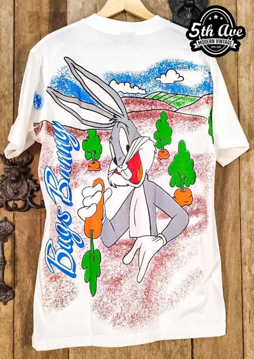 Bugs Bunny – Hare to the Throne – New Vintage Graphic Tee vintage t-shirt laid on bed