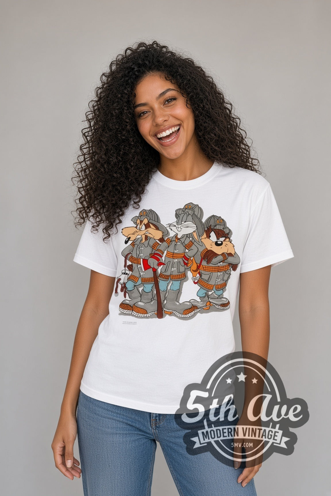 Model wearing the Looney Tunes Bugs Taz Ralph Wolf Firefighters cartoon tee in white