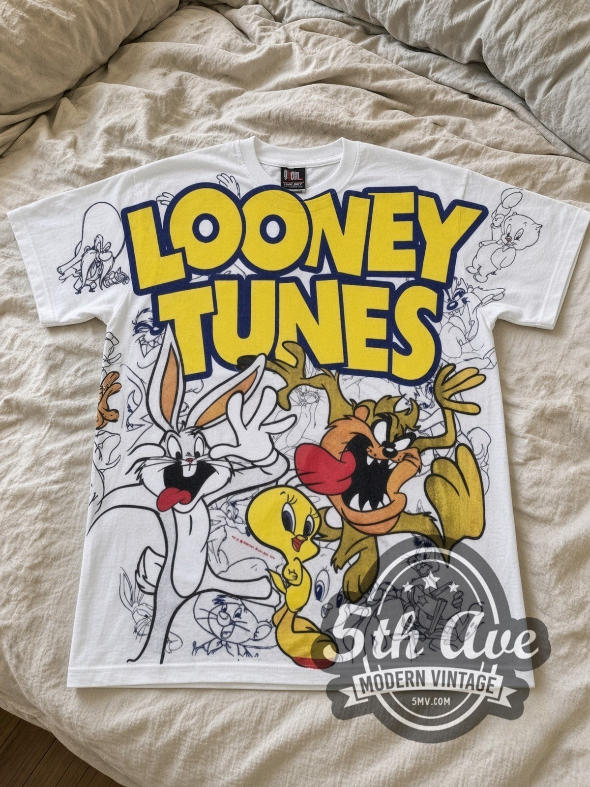 Looney Tunes Logo Bugs Tweety Taz Crew all-over-print vintage cartoon tee in white laid flat