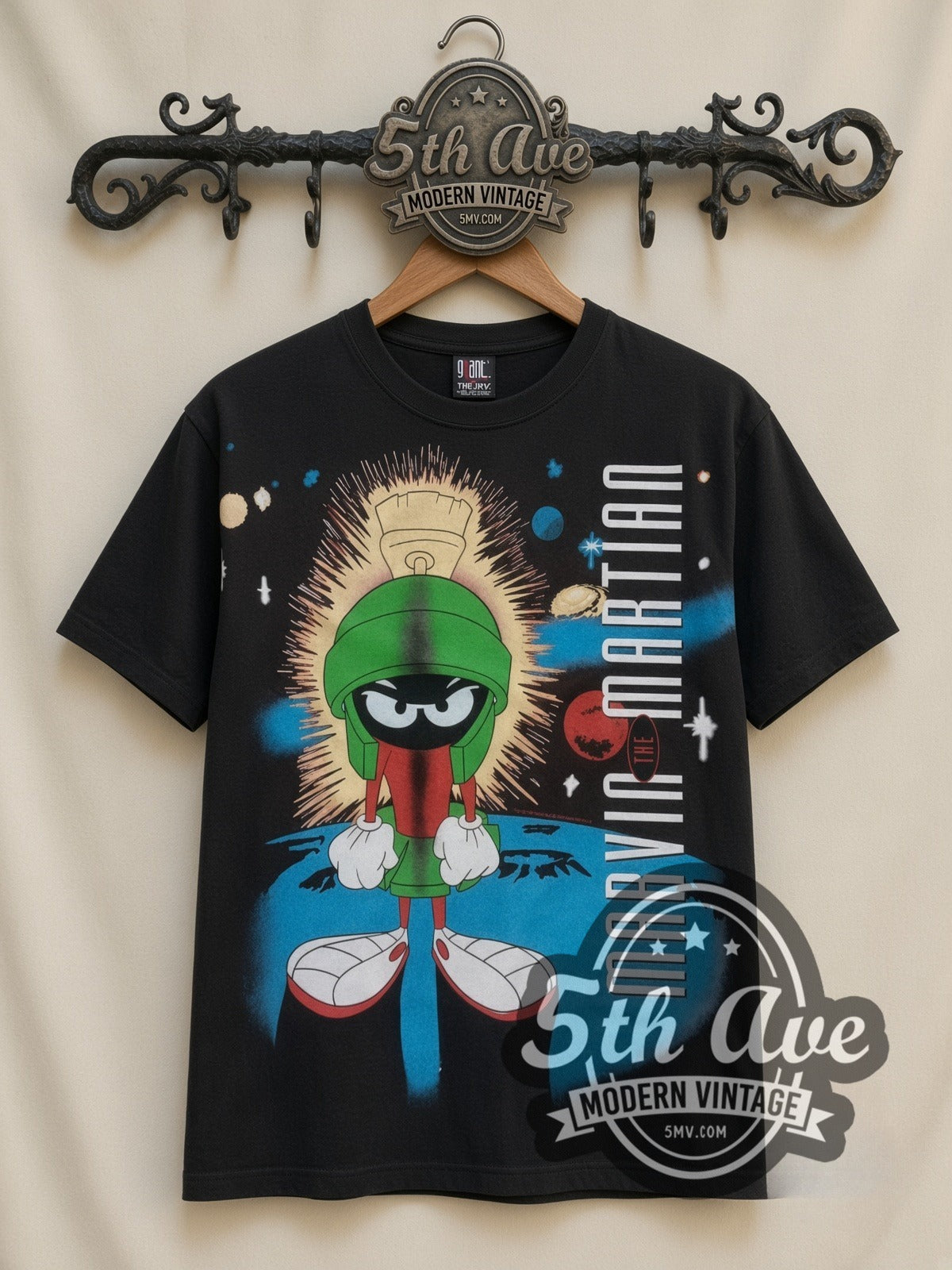 Looney Tunes Marvin the Martian Portrait all-over-print vintage cartoon t-shirt in black, front view on a display rack