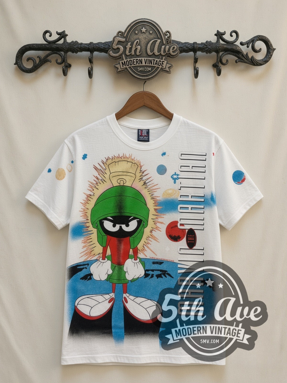 Looney Tunes Marvin the Martian Portrait all-over-print vintage cartoon t-shirt in white, front view on a display rack