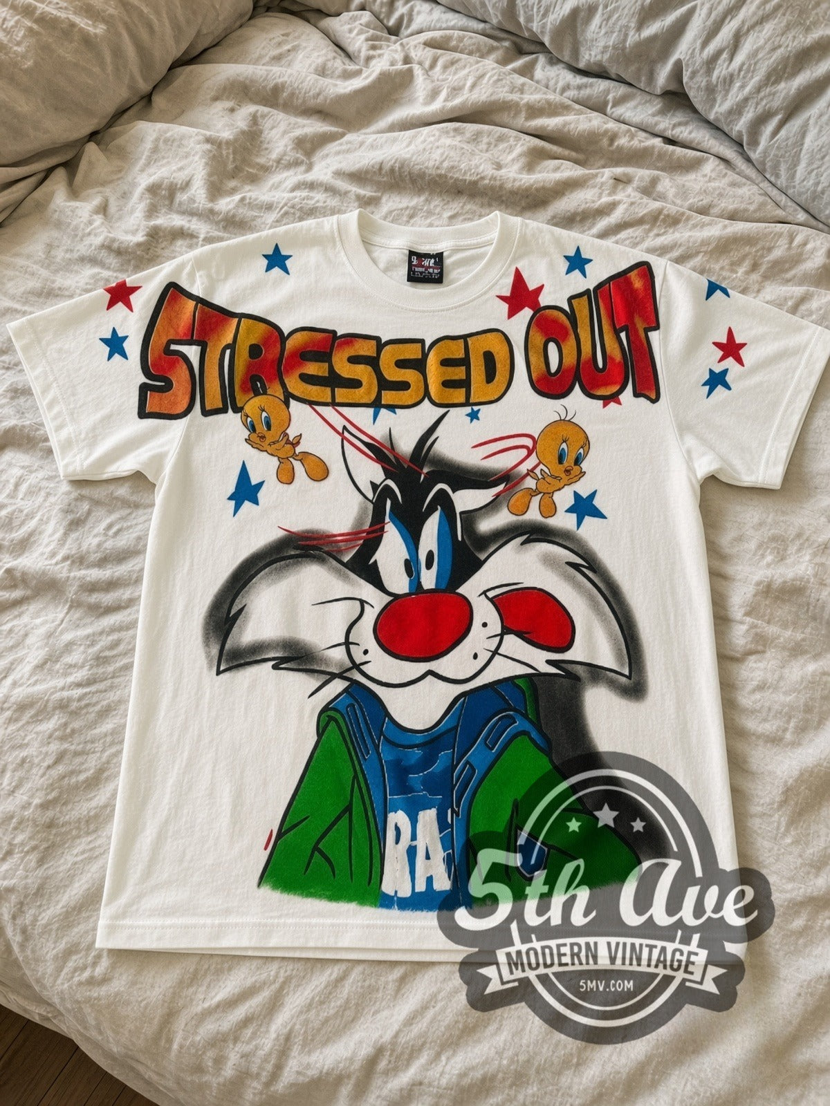 Looney Tunes Sylvester & Tweety Stressed Out all-over-print vintage cartoon tee in white laid flat