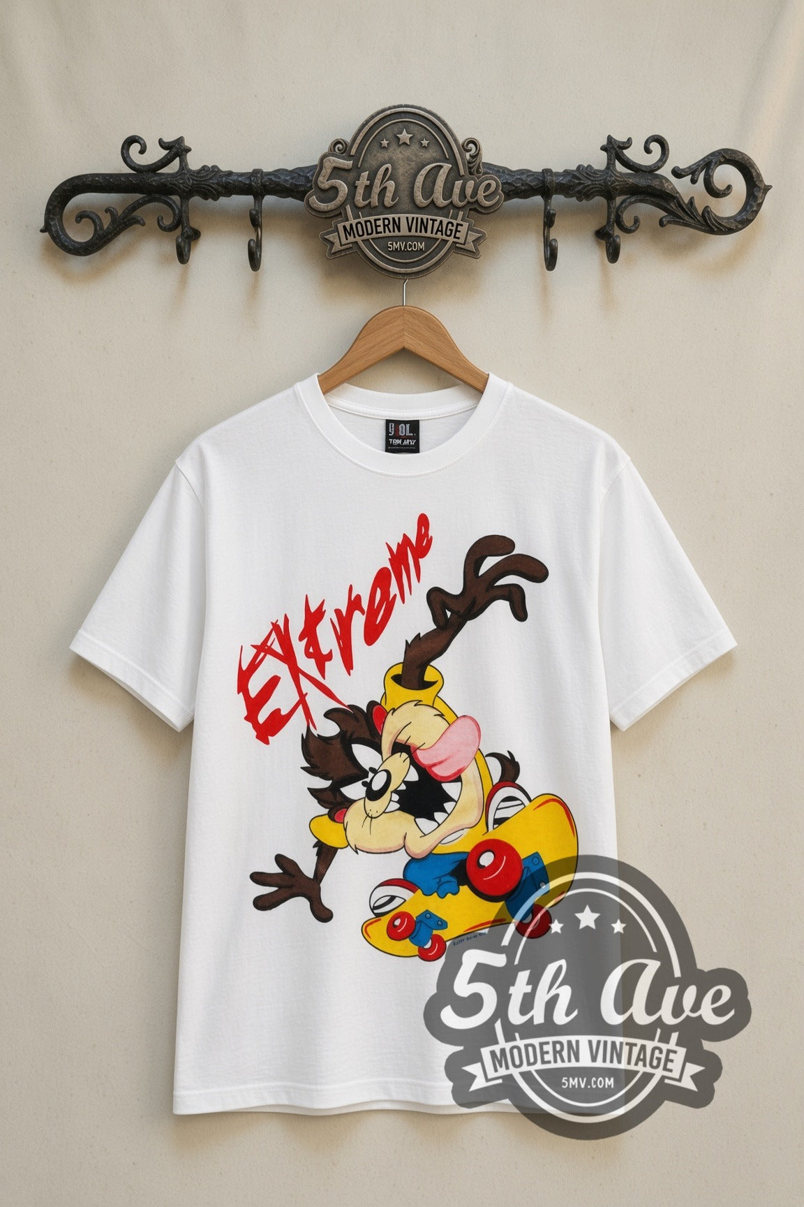Looney Tunes Taz Extreme Skate cartoon tee in white, front view on a display rack