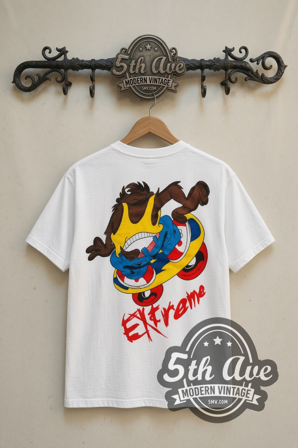 Looney Tunes Taz Extreme Skate cartoon tee in white, back view on a display rack