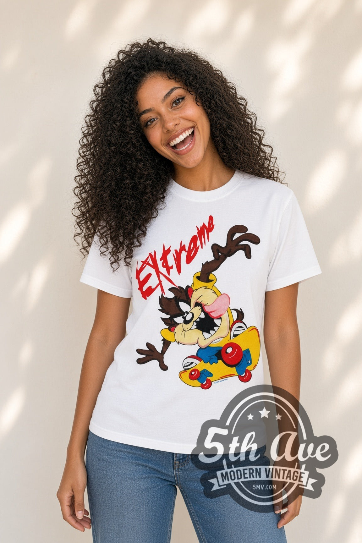Model wearing the Looney Tunes Taz Extreme Skate cartoon tee in white
