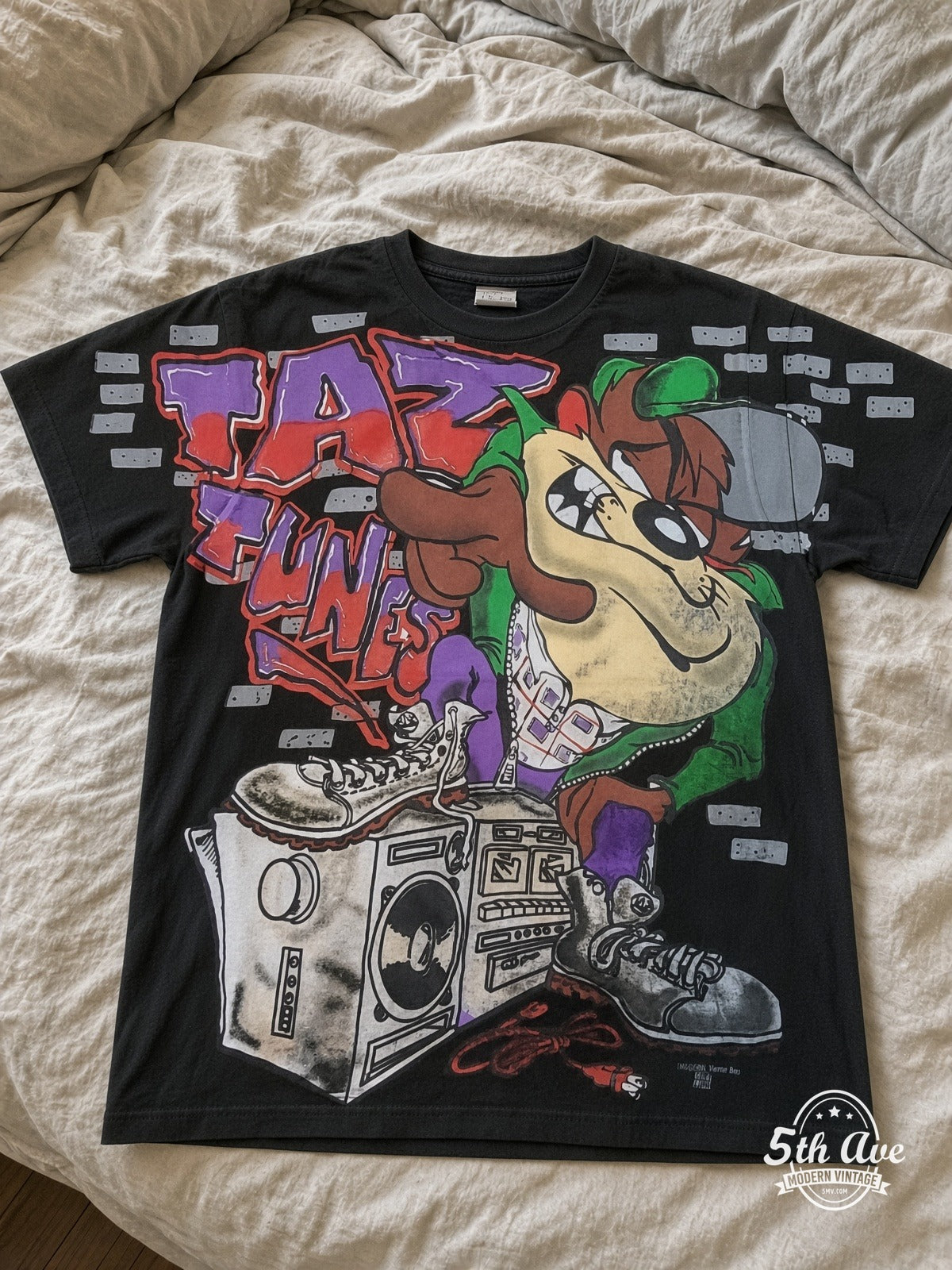 Looney Tunes Taz Funk Boombox vintage tee laid on bed