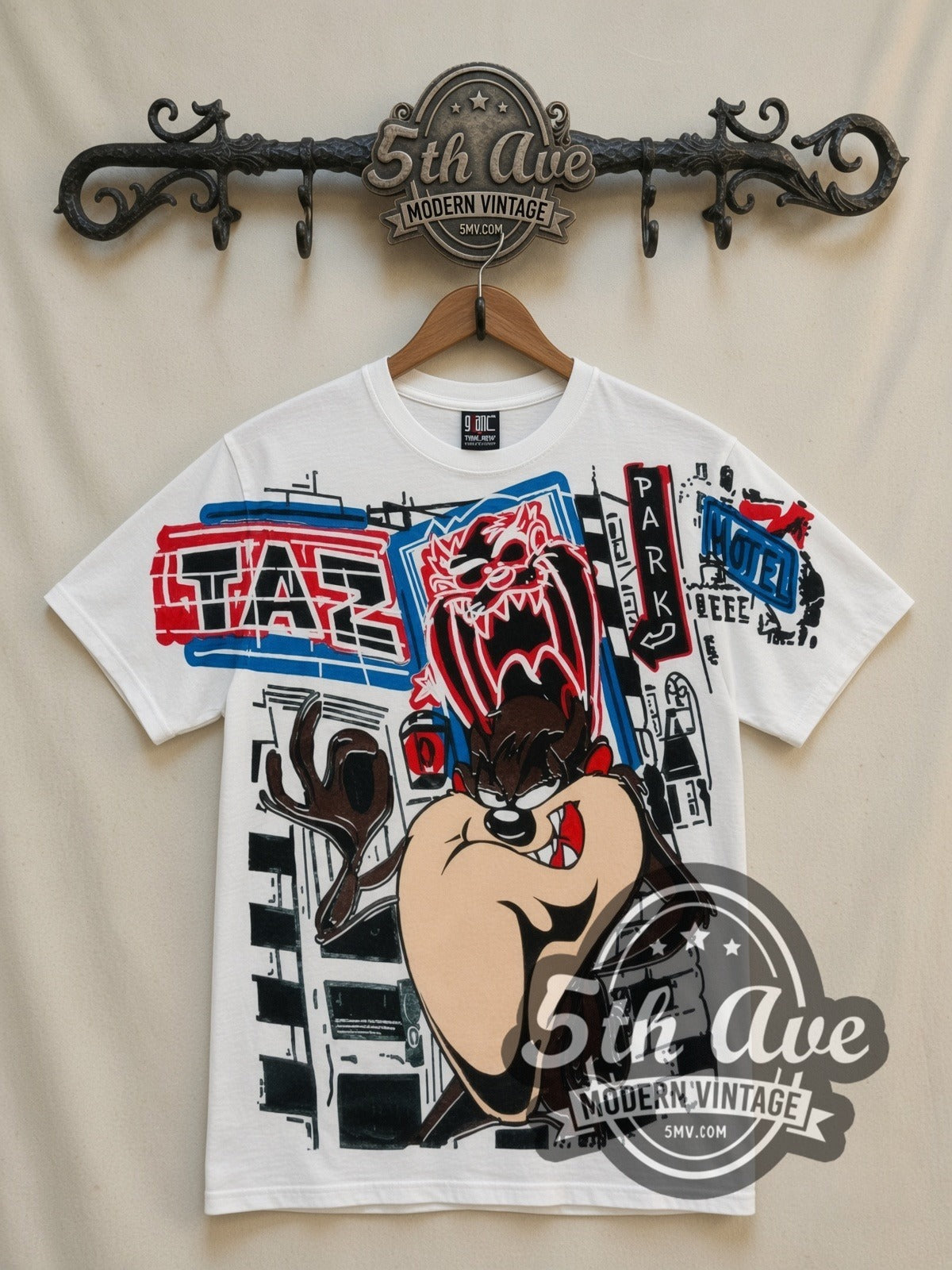 Looney Tunes Taz Graffiti Street all-over-print vintage cartoon t-shirt in white, front view on a display rack