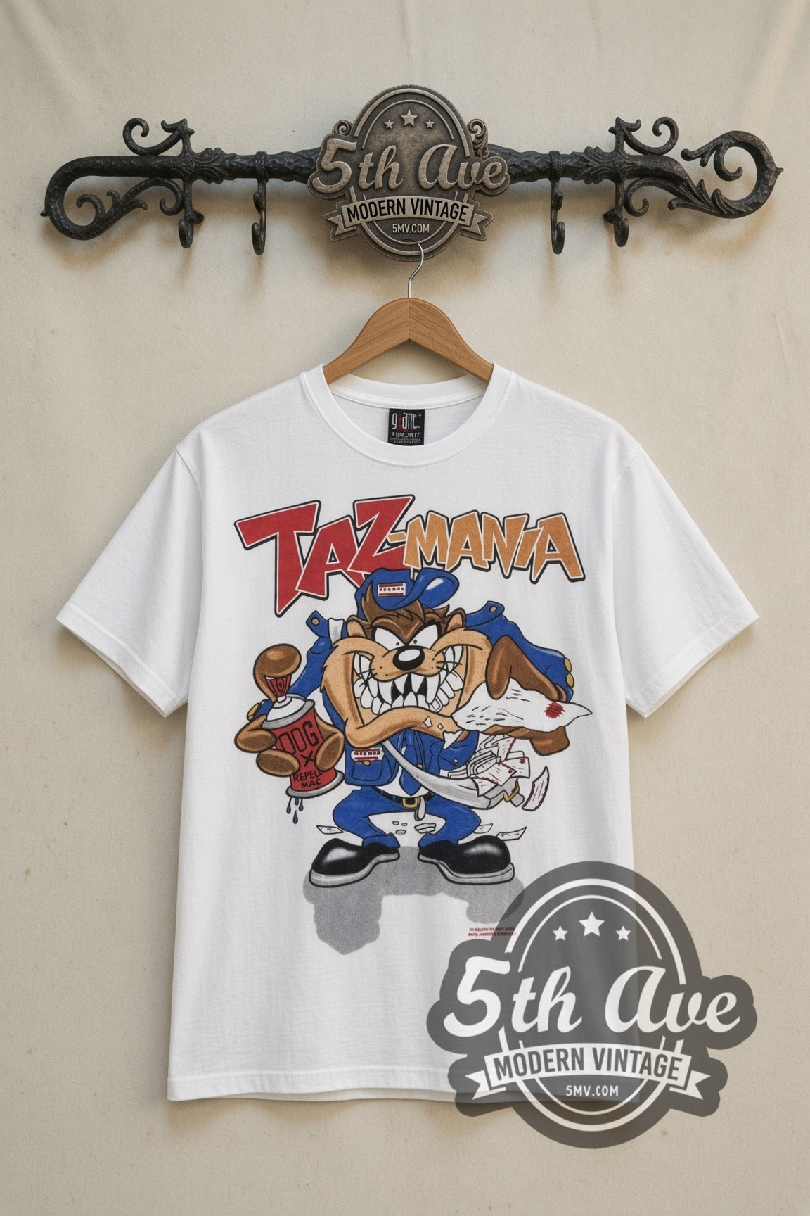 Looney Tunes Taz Hip-Hop Streetwear with Gossamer cartoon tee in white, front view on a display rack