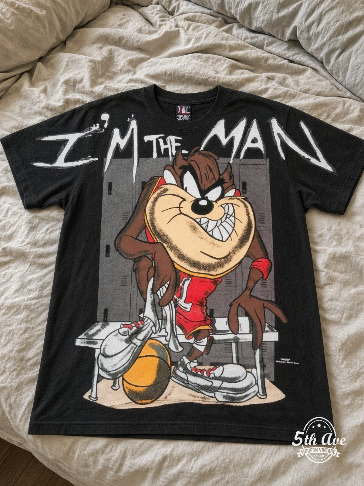 Looney Tunes Taz I'm The Man Basketball vintage tee laid on bed