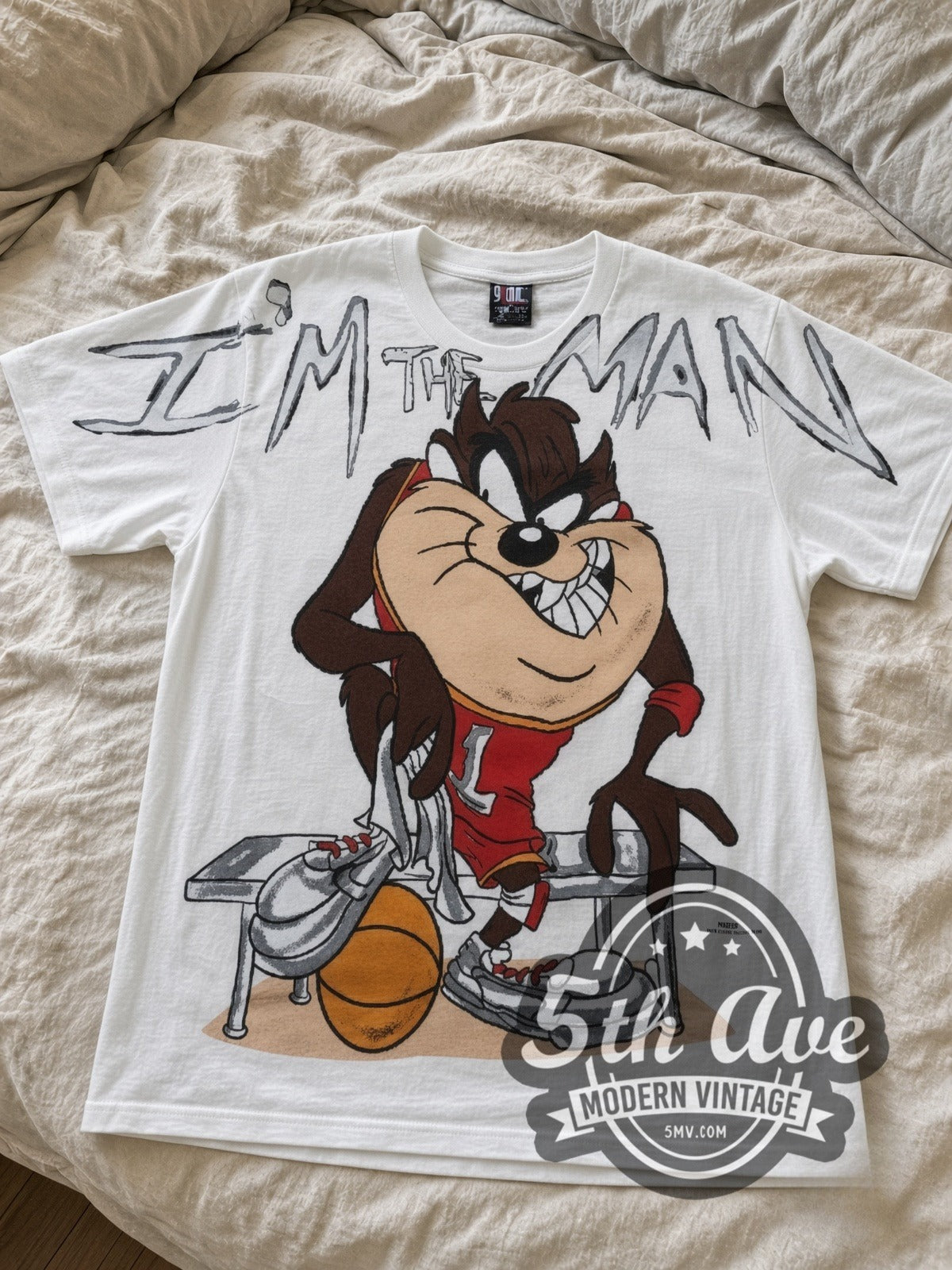 Looney Tunes Taz I'm The Man Basketball all-over-print vintage cartoon tee in white laid flat