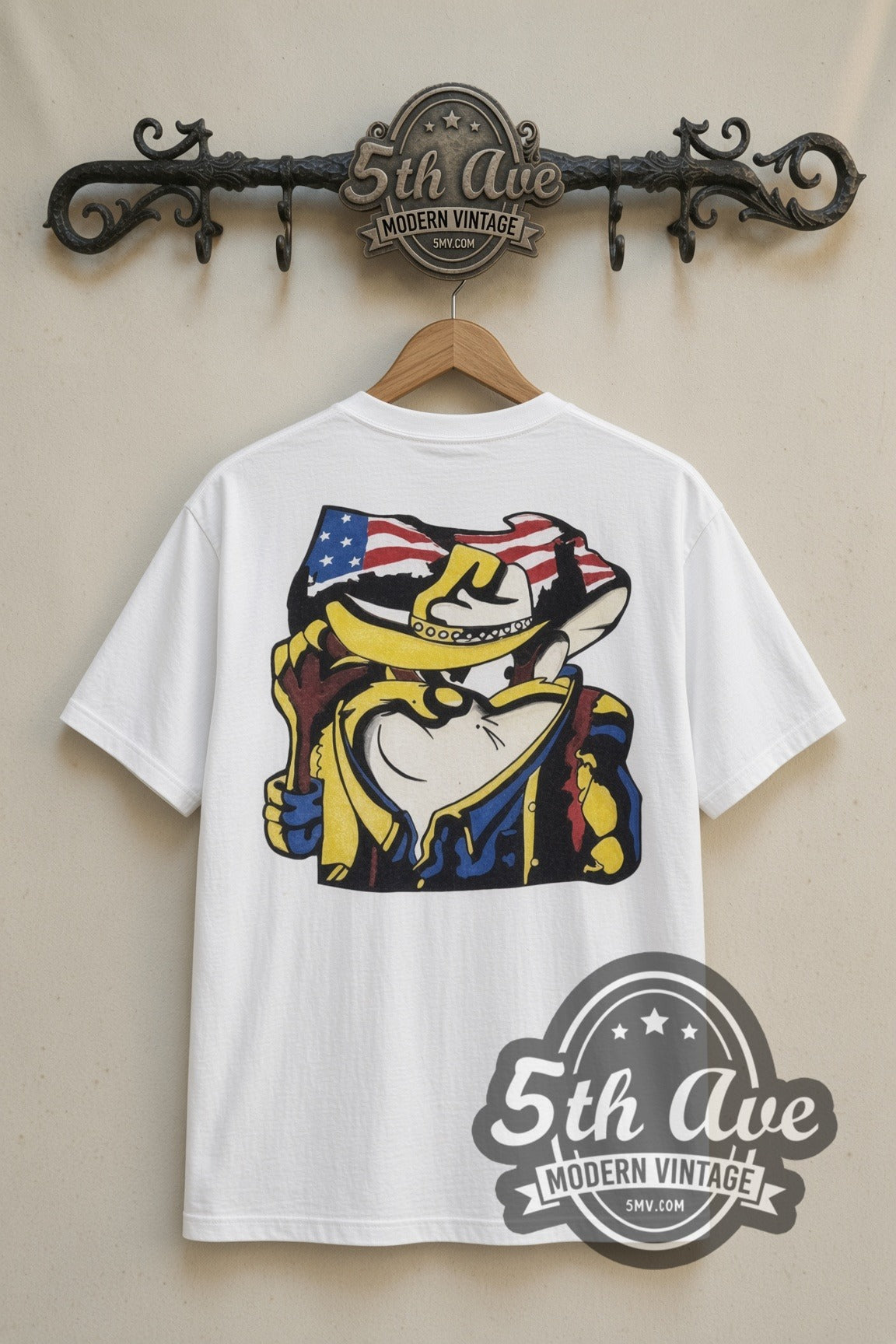 Looney Tunes Taz Made in the USA Cowboy Flag cartoon tee in white, back view on a display rack