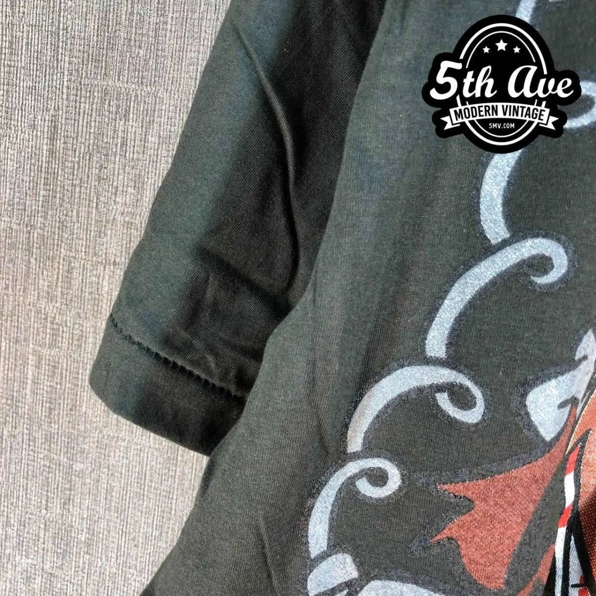 Model wearing Looney Tunes – Taz's Truckin' Co. – New Vintage Graphic Tee vintage band tee