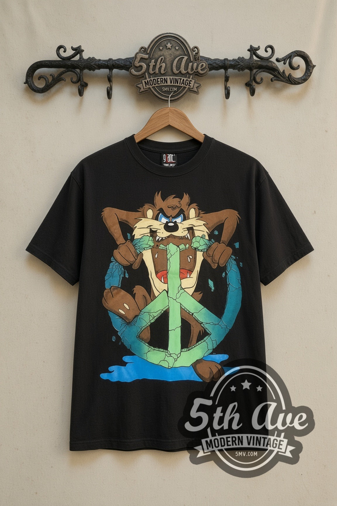 Looney Tunes Taz Peace Sign cartoon tee in black, front view on a display rack