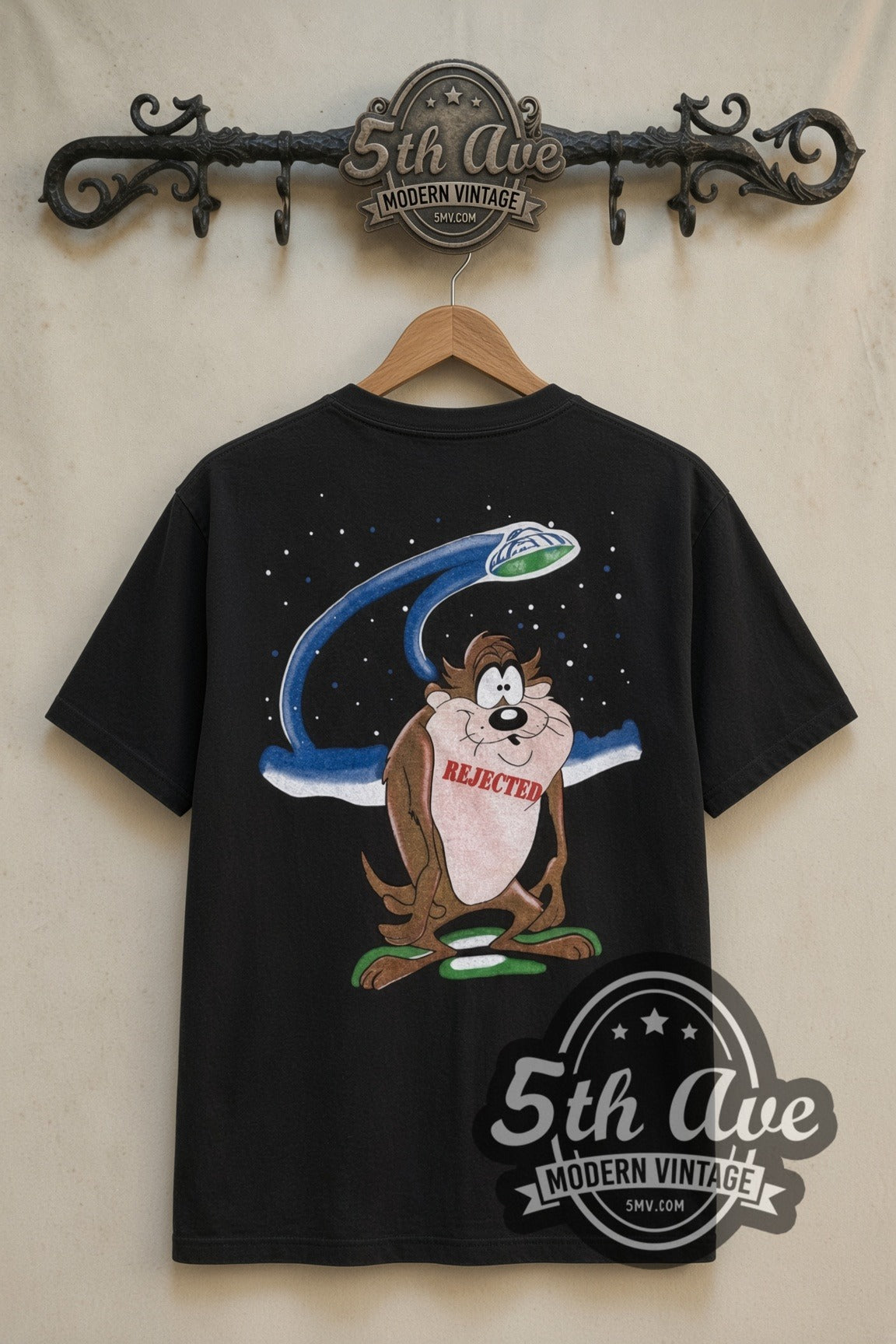 Looney Tunes Taz Rejected UFO cartoon tee in black, back view on a display rack
